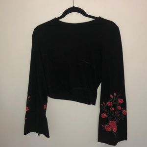 black crop top with rose bell bottom sleeves